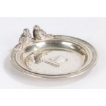 Continental silver pin dish, the gadrooned border with raised cast depiction of two birds, the