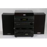 Akai AC-M55 Hifi stereo system, consisting of a record player, tuner, amplifier, cassette deck and a