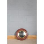 Convex mirror with painted faux porphyry metal frame, 45cm diameter