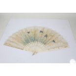 19th Century bone folding fan, the bone sticks with pierced roundel and gilt decoration, the silk