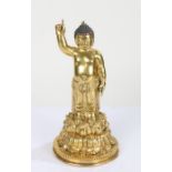 Chinese gilt bronze figure depicting Buddha as a young boy, 24cm high
