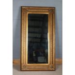 19th Century bevelled pier glass with intricate carved and moulded foliate gilded frame, 82cm x