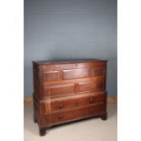 18th century oak mule chest, having hinged lid, plain oak panelled front above two short and one