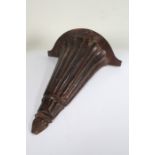 19th Century wall bracket, the stained wood bracket with a gadrooned tapering body, 47cm long