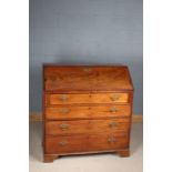 George III mahogany bureau, the inlaid drop fall enclosing a fitted interior, fitted four long