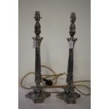 Pair of silver plated table lamps, the acanthus leaf capped reeded columns with raised on acanthus