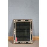 Black painted and parcel gilt rectangular wall mirror, with cream applied foliate decoration, 61cm x