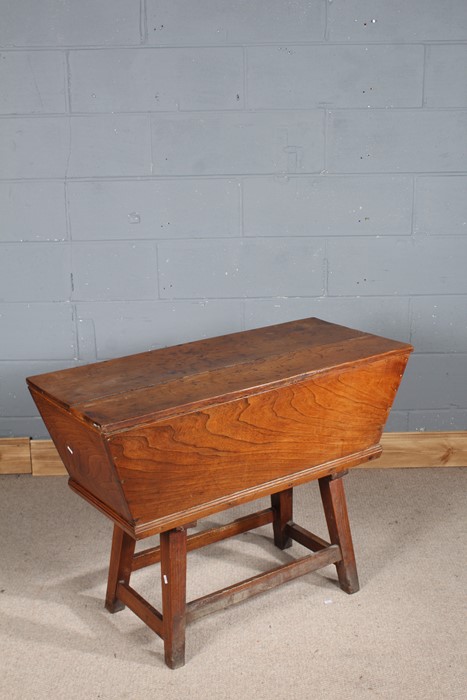 19th century elm dough bin, having lift up lid and two section interior, raised on block legs, 100cm