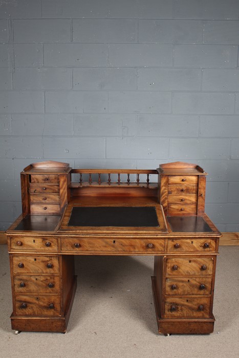 19th century mahogany writing desk, the top having gallery back, two banks of drawers with locking