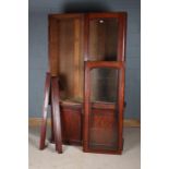 Large Victorian mahogany bookcase, having a pair of glazed doors and cupboard below, 117cm wide x