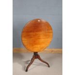 19th century mahogany tilt top occasional table, the circular top above a knopped column and