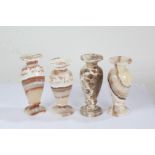 Four decorative marble vases. of baluster form, the tallest 25cm high (4)