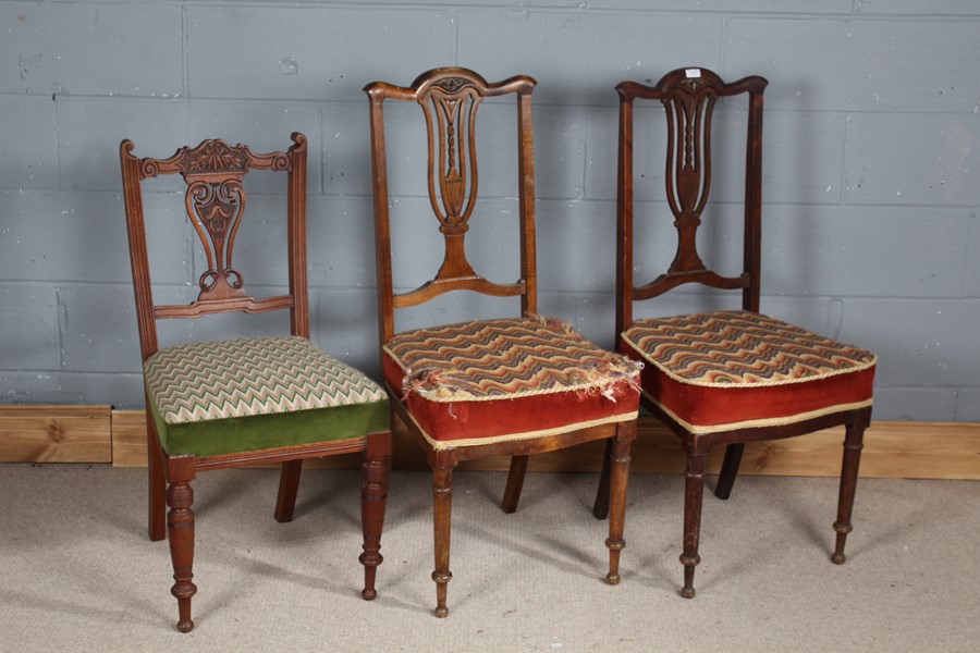 Pair of late Victorian dining chairs, each with carved urn and pierced splats, together with one