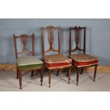 Pair of late Victorian dining chairs, each with carved urn and pierced splats, together with one