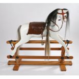 Lines Brothers Ltd. rocking horse, the white painted body with black and white mane and tail,
