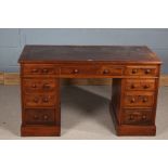 Victorian mahogany twin pedestal desk, the rectangular top with a red inset tooled leather top, with