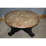 Circular coffee table with faux marble top, on black painted baluster legs, flattened stretchers and