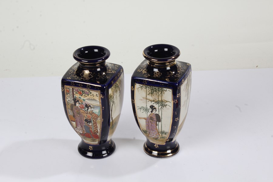 Pair of early 20th Century satsuma vases, the blue ground with gilt foliate decoration and painted