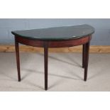 Edwardian mahogany demi lune table, with a glass top, raised on square tapering legs, 119cm wide