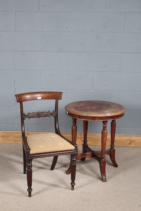 Late Victorian mahogany table, the circular top above four turned legs and splayed feet united by