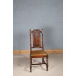 Jacobean style oak chair, having beaded back rest flanked by barley twist columns either side, 105cm