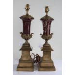 Pair of brass and rosso levante marble table lamps in the form of urns set upon decorated
