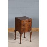 18th century style walnut bedside cupboard, the serpentine top above a single drawer and cupboard