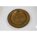 17th Century brass alms dish, with embossed roundel decoration, AF, 38cm diameter