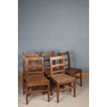Set of five 19th Century oak dining chairs, the square backs with a crested splat, raised on