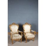 Pair of French style gilded armchairs, having carved pierced back with flowerheads, the open