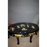 Chinese ebonised oval occasional table, the top with mother of pearl depictions of female