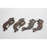 Four 19th Century bronze putti mounts, 17cm long (4)