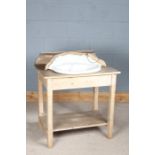 Victorian style stripped pine washstand, having porcelain basin with shell motif, above a single