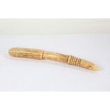 Late 19th/early 20th Century African Ivory pestle, with ring turned handle, 50cm long