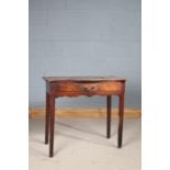 19th century mahogany side table, having serpentine top above a single drawer, raised on square