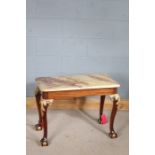 Faux marble topped oblong low table with gilt scroll decoration to the shoulders of the cabriole