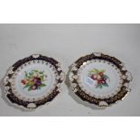 Pair of late 19th/early 20th Century porcelain plates, each of shaped form with shell motif