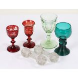 Four 19th Century drinking glasses, to include a uranium wine glass, two ruby sherry glasses and a