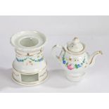 Late Victorian porcelain teapot on stand, having floral painted decoration lifting off the