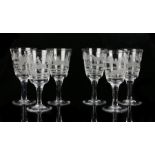 Set of six hunting wine glasses, each with scenes of fox hunting and tress and a house to the