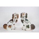 Victorian Staffordshire pottery spaniel, with green and brown lustre decoration, 32cm high,