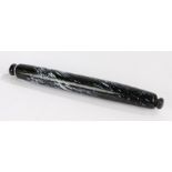 19th Century glass rolling pin, the black body with white fleck decoration, 38cm wide