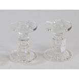 Pair of Waterford crystal knife rests, with ringed central columns and star moulded end sections,