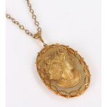 9 carat gold and diamond set cameo pendant, the pendant with a hardstone back and profile of a