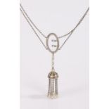 Early 20th Century diamond and pearl necklace, with twin chains to the buckle and tassel drop