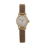 Omega 9 carat gold ladies wristwatch, the signed silver dial with baton markers, manual wound, the