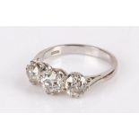 18 carat white gold and diamond ring, with three round cut diamonds to the head, the central diamond