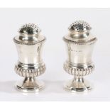 Matched pair of Victorian and possibly earlier silver pepperettes, one Birmingham 1884, maker Horace