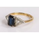 Art Deco 18 carat gold sapphire and diamond set ring, the central sapphire flanked to either side by