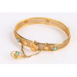 Yellow metal and turquoise set bangle, the fret bangle with three turquoise stones, 5cm wide, 7.8